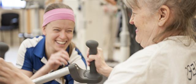 Physical therapy student works with a client
